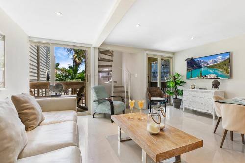 The ocean waves are calling! Relaxing setting with pool view in beachfront resort Texas