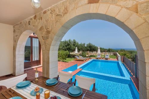 Exterior view, Villa Katerina with Eco heated pool near Monumental Olive Tree of Vouves