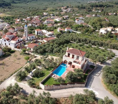 Exterior view, Villa Katerina with Eco heated pool near Monumental Olive Tree of Vouves