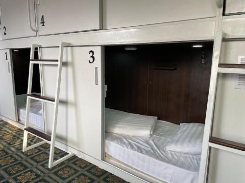 Capsule hotel TechnoCave - Tap to explore photos
