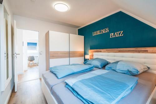 Ferienhaus Steuerbord mit Kamin und Terrasse - 4 Sterne DTV-Klassifizierung in Carolinensiel, Deutschland