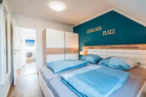 Ferienhaus Steuerbord mit Kamin und Terrasse - 4 Sterne DTV-Klassifizierung in Carolinensiel, Deutschland