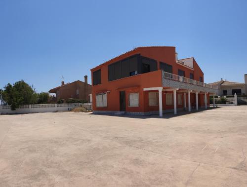 Chalet de 5 y 3 habitaciones dividido en planta baja y primera planta a primera linea de playa gîte à louer El Brosquil