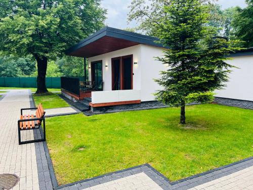 WRZOS resort & wellness **** DOMKI CAŁOROCZNE WRZOS resort & wellness **** DOMKI CAŁOROCZNE