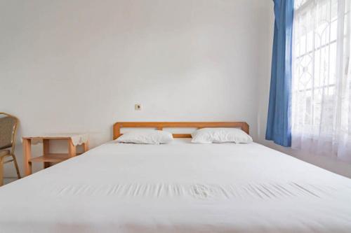Pall Inn Puncak Mitra RedDoorz - Gunung Batu Jonggol