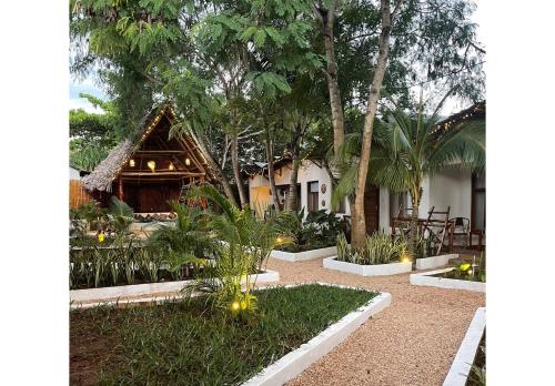 巴巴勞平房飯店 (Babalao Bungalows) in 桑吉巴