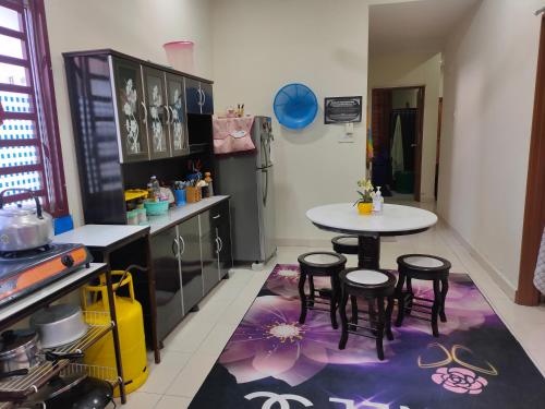 Homestay Intan Payung Bukit Katil Tuah Perdana - Tap to explore photos