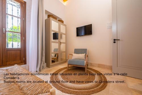 Small Double Room - Lower level room in Casa Aura Hotel