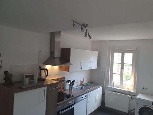 Konyha, Gemütliche Wohnung *zentral* *Netflix* *Parkplatz* (Gemutliche Wohnung *zentral* *Netflix* *Parkplatz*) in Bad Laasphe