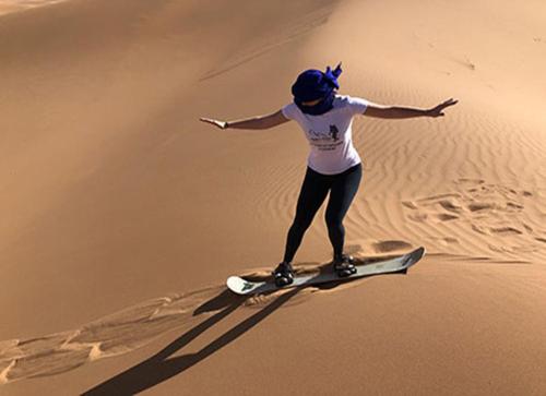 Erg Lihoudi Luxury desert camp with Camel ride, meals & sandboarding