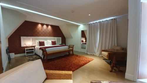 Master Double Room room in Pousada Annecy - CAPIVARI Fácil acesso ao centrinho e Baden Bar