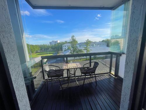 Beach Side Apartment with a Balcony