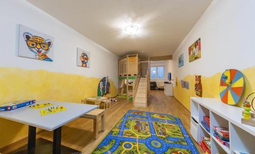 Wellness- und Familienhotel Garni Dachsteinresort in Russbach am Pass Gschütt, Österreich