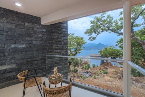 Balcony/terrace, SaffronStays Yahvi Waters By Kosha Villas, Pawna in Kolechafesar