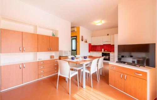 Amazing Home In Albarella Ro With Kitchen