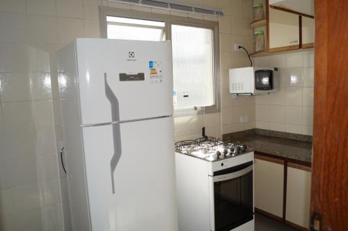 Apartamento para alugar - temporada in เอนเซียดา