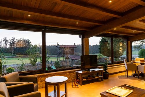 Közös társalgó / TV, Casa Castineira in Frixe