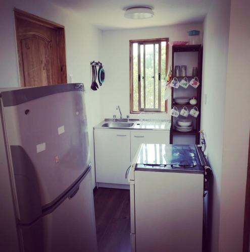 ห้องครัว, Cabañas VistaBosque de Algarrobo (Cabanas VistaBosque de Algarrobo) in อัลการ์โรโบ