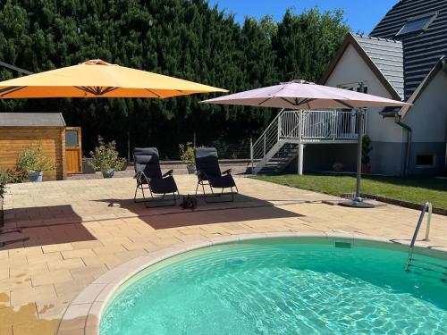 Úszómedence, Chambre Executive Luxe et Confort pour vos Séjours (Chambre Executive Luxe et Confort pour vos Sejours) in Schweighouse Sur Moder