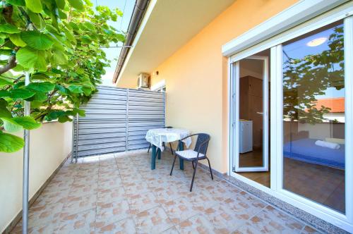 Double Room with Balcony room in Apartments Petra