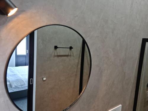Kamar Mandi, BED Cauchy in Namur