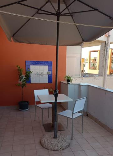 balkon/terras, White Beach in Lido
