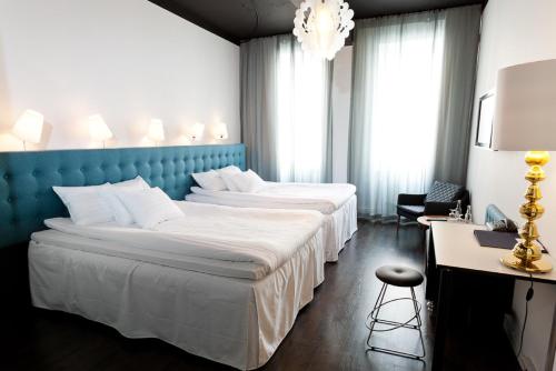 Family Room (2x 140 cm bed) room in Hotel Flora