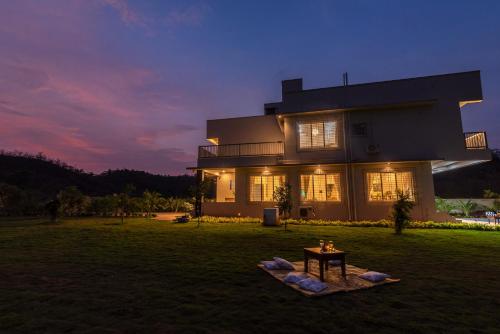 SaffronStays Midori - 4BR riverside villa with pool, lawn, terrace & access to Kundalika River rafting site - Admal