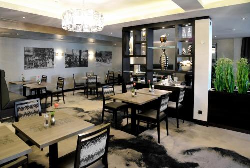 Étterem, Kurhotel Grüttner mit eigenem Sole Thermal Schwimmbad 32 Grad und Saunalandschaft (Kurhotel Gruttner mit eigenem Sole Thermal Schwimmbad 32 Grad und Saunalandschaft) in Erwitte