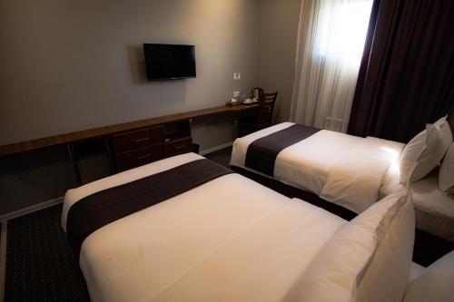 Sharaf Hotel – Toshkent, NY