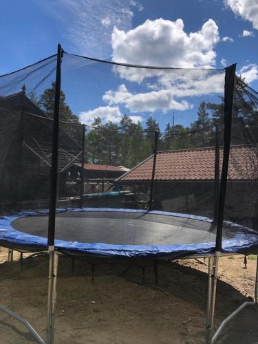 Timber cottages with jacuzzi and sauna near lake Vänern