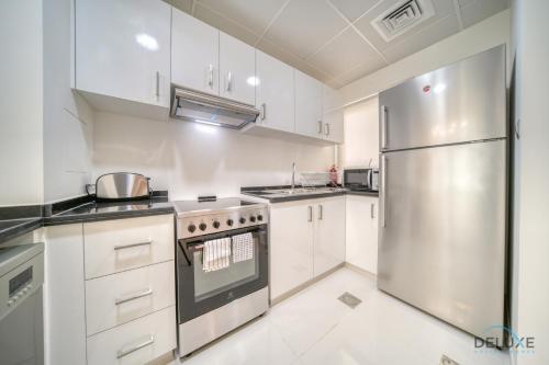 Cheerful 3BR Townhouse at DAMAC Hills 2, Dubailand by Deluxe Holiday Homes, Dubaj (fotografie 6)