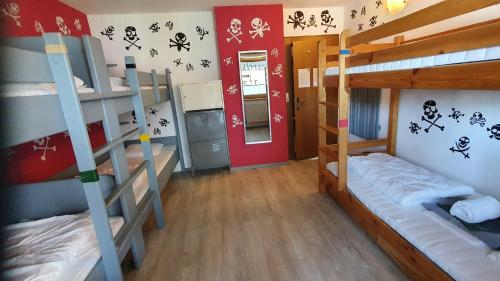 Bed in 6-Bed Mixed Dormitory Room with Shared Bathroom and Toilet