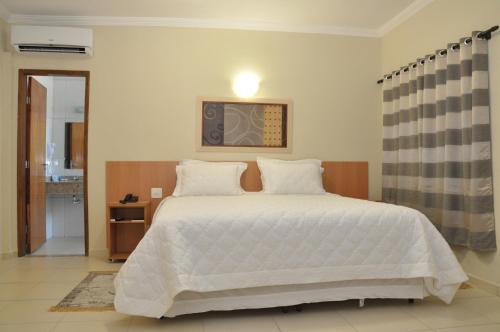 Lotus Hotel - à 6 km do Santuário de Aparecida-SP (Lotus Hotel - a 6 km do Santuario de Aparecida-SP) in กวาราตินกิวต้า