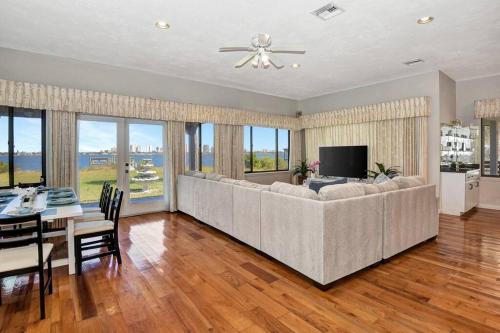 Shared lounge/TV area, One of a Kind, two story, gated Halifax Riverfront in South Daytona (FL)