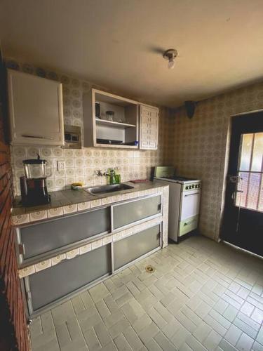 Cocina, Cabaña la Quindiana Paipa (Cabana la Quindiana Paipa) in Canocas