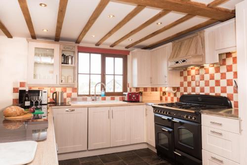 Zunanjost, Tyddyn Morthwyl in Gell Farm