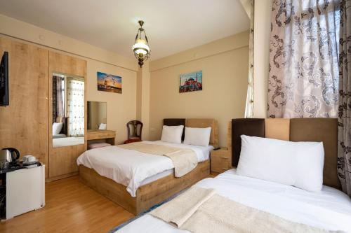 Chambre triple, deluxe