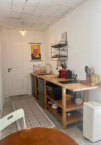 Gîte Le Palmier - Perfectly located cosy studio with private garden