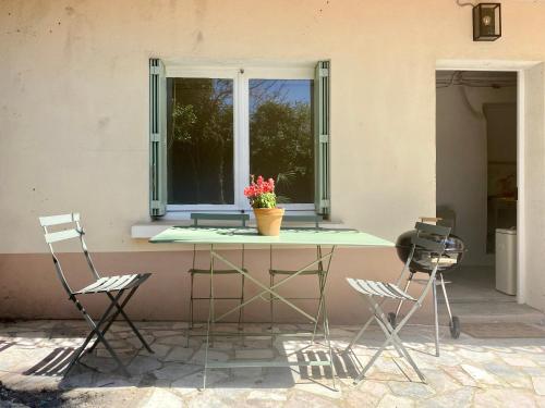 Gîte Le Palmier - Perfectly located cosy studio with private garden