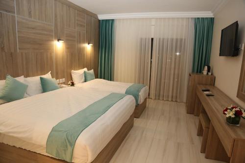 Chambre triple, deluxe