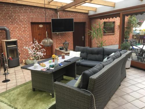 Koplietošanas atpūtas telpa ar TV, Ferienwohnung Ingrid an der Schlei in Karby