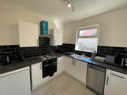 3 bedroom Garden apartment next to craig-y-don park