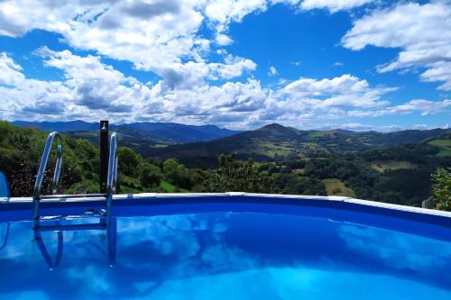 Swimming pool, Casa Rural El Corquieu de la Cava in Pilona