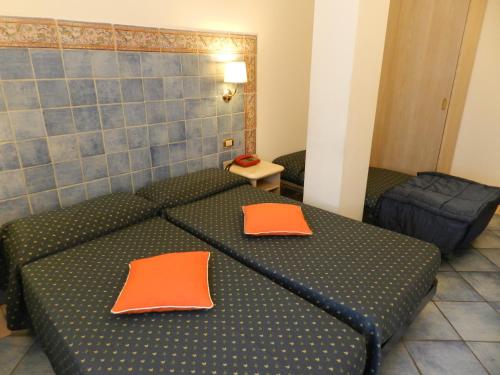 Camera tripla, 3 letti