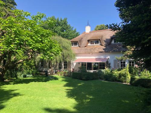 . Bed and Breakfast De Haen - Privé-appartementen van 43 of 60 m2 met tweepersoons bubbelbad - Finse sauna - in westvleugel van luxe villa