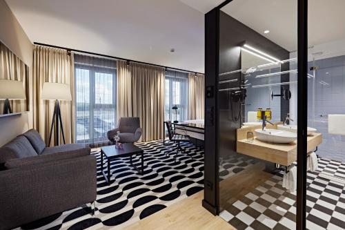 ห้องส่วนกลางสำหรับนั่งเล่น/ดูทีวี, LEGERE HOTEL Erfurt in แอร์ฟวร์ท