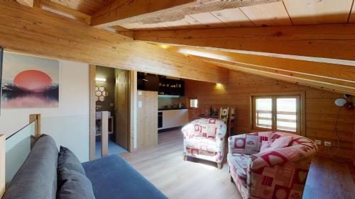 Общ салон/телевизионна зона, Chalet des Alpes NATURE & MOUNTAIN by Alpvision Résidences (Chalet des Alpes NATURE & MOUNTAIN by Alpvision Residences) in Център на града