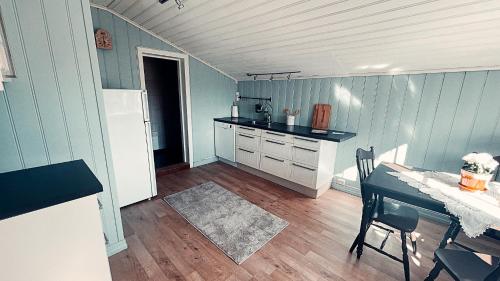 Finnegården Røros (Finnegarden Røros) in โรโรส