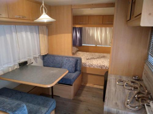 1 double bed, 2 bunk beds, 1 sofa bed